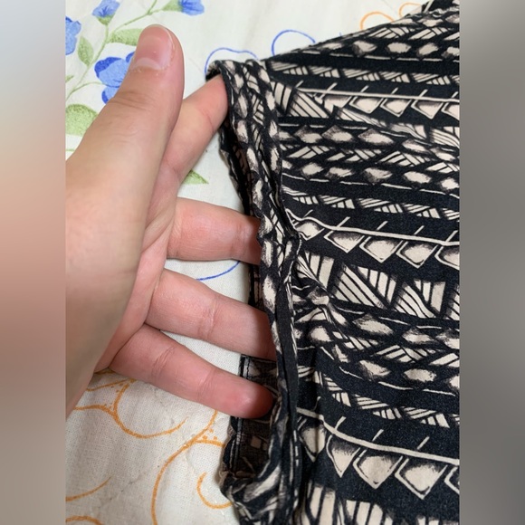 Black and tan geometric short sleeve tunic with cut out back from Dynamite - Picture 5 of 14